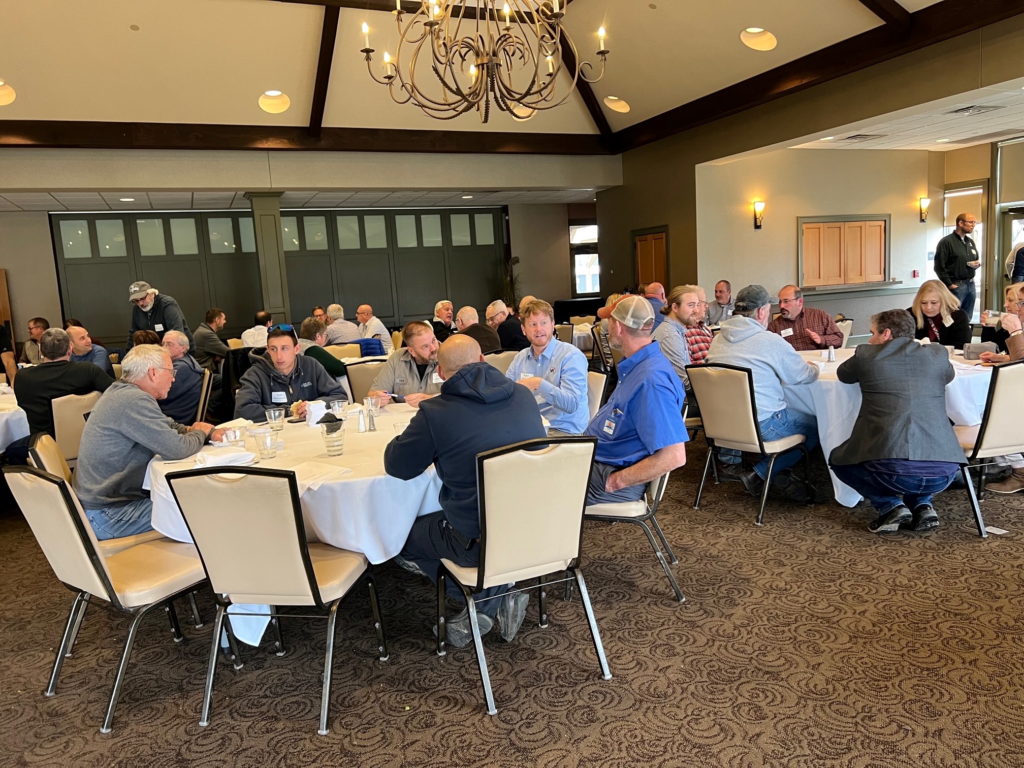 groups of people at tables