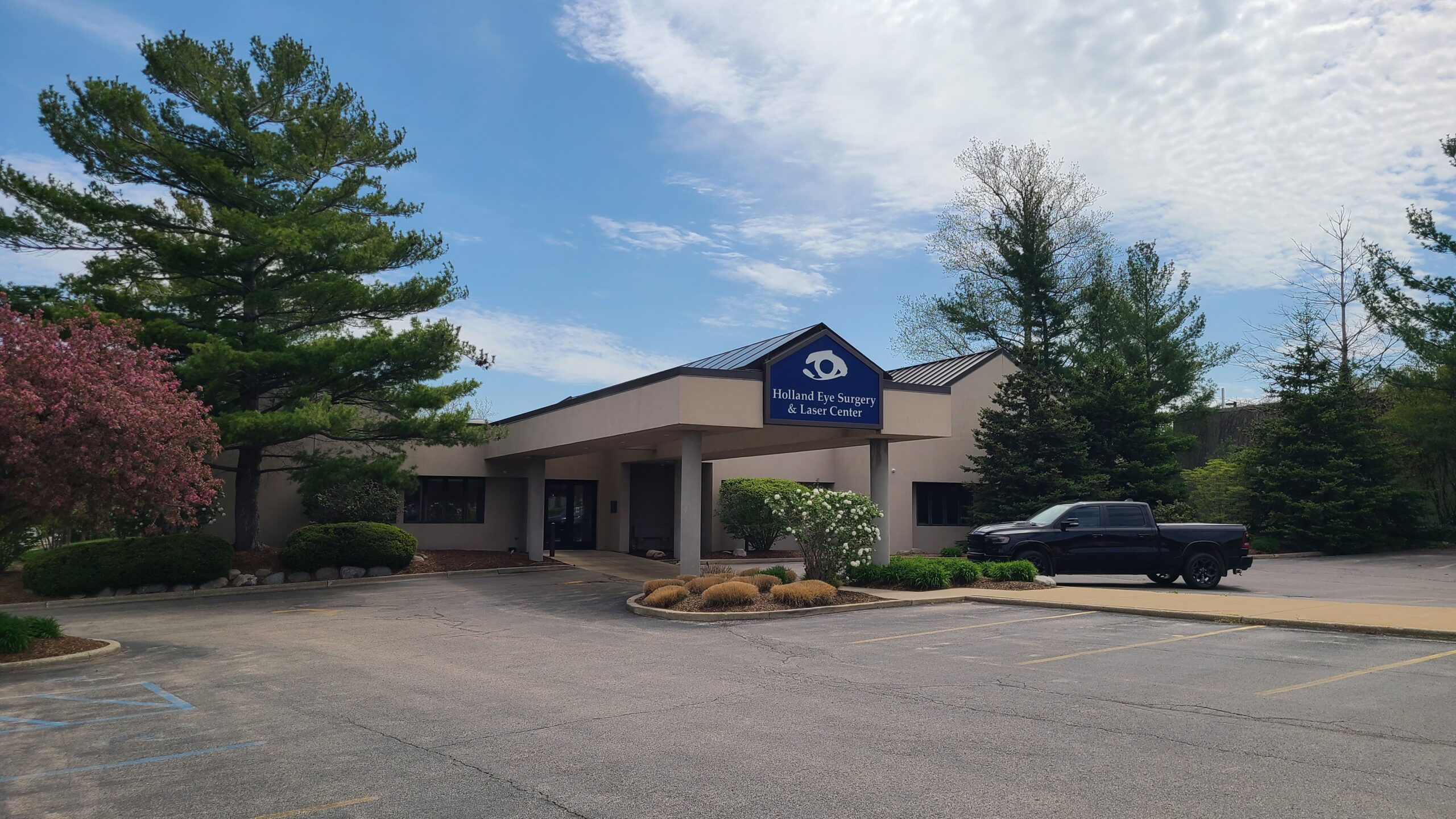 parking lot in front of Holland Eye Care entrance