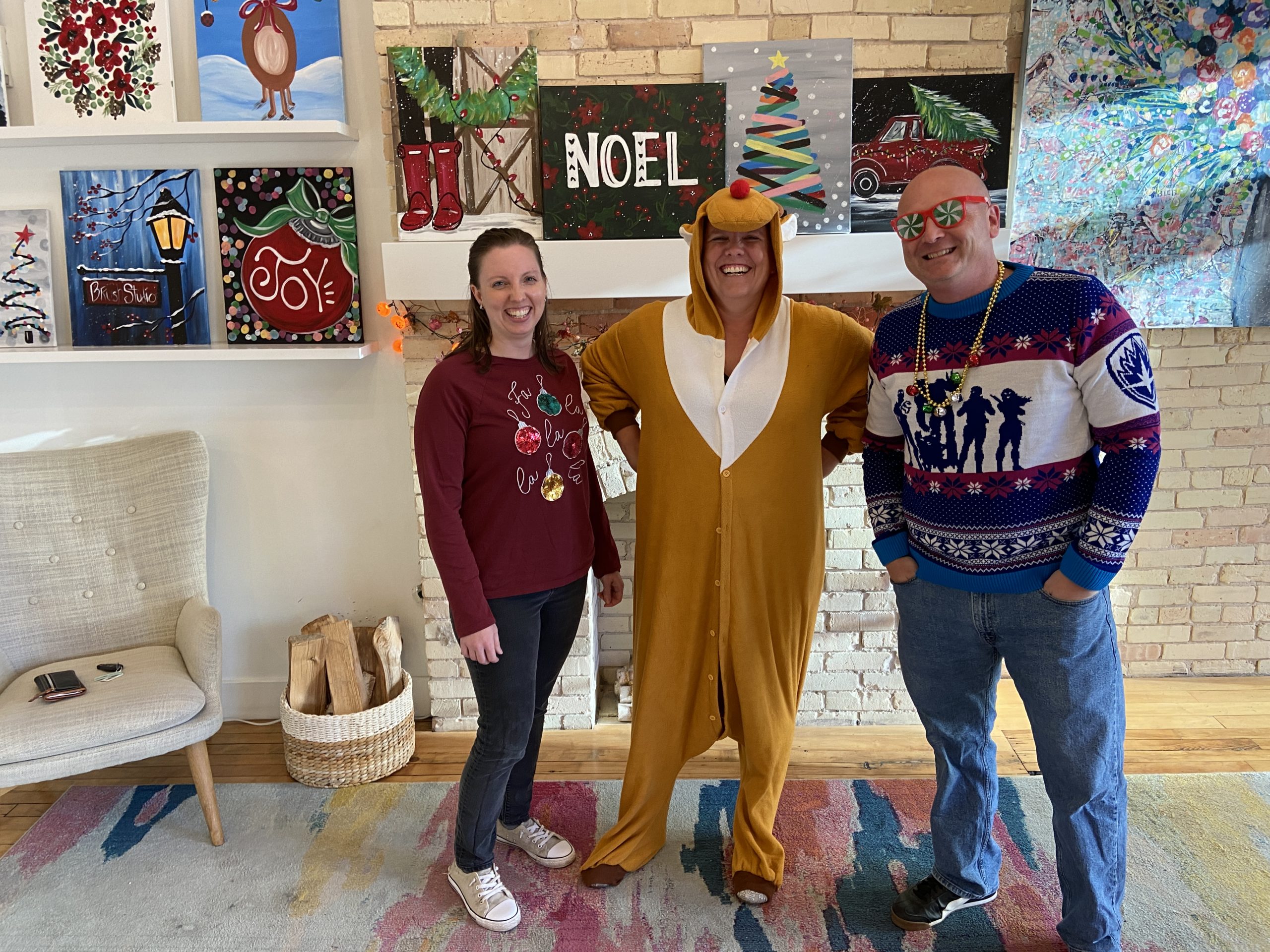 3 people wearing holiday apparel