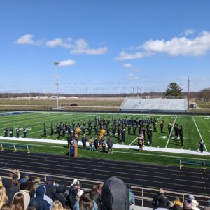 football field with band on it